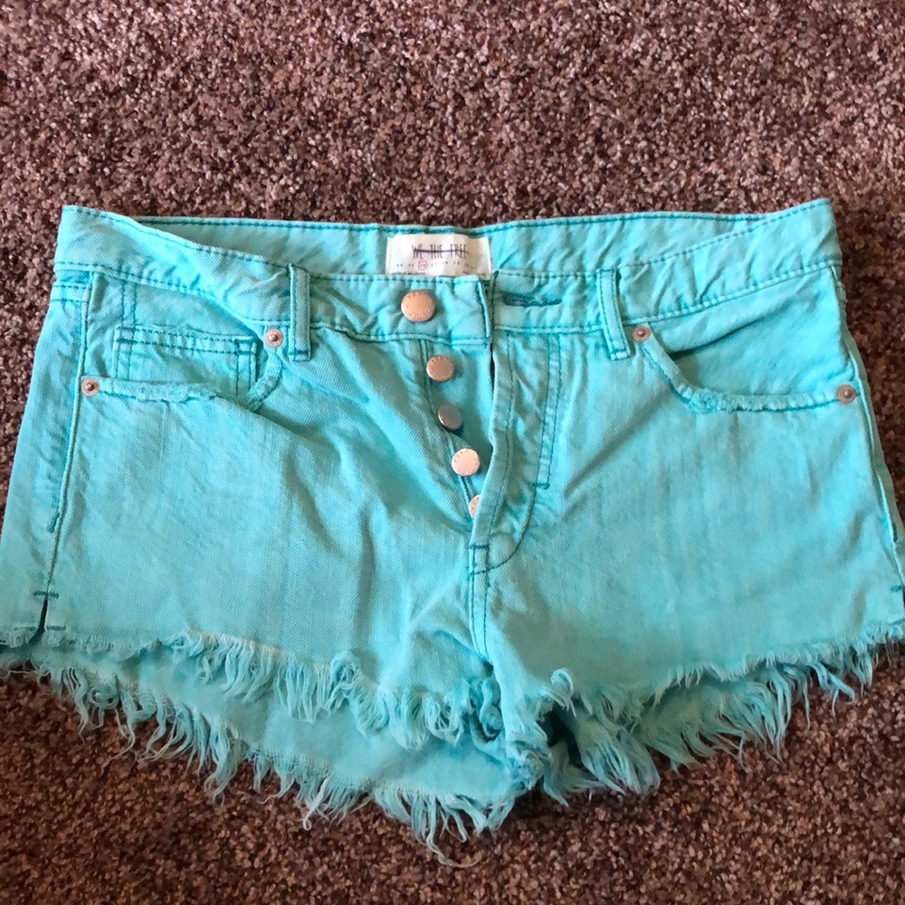 Gently worn FREE PEOPLE fringed jean shorts